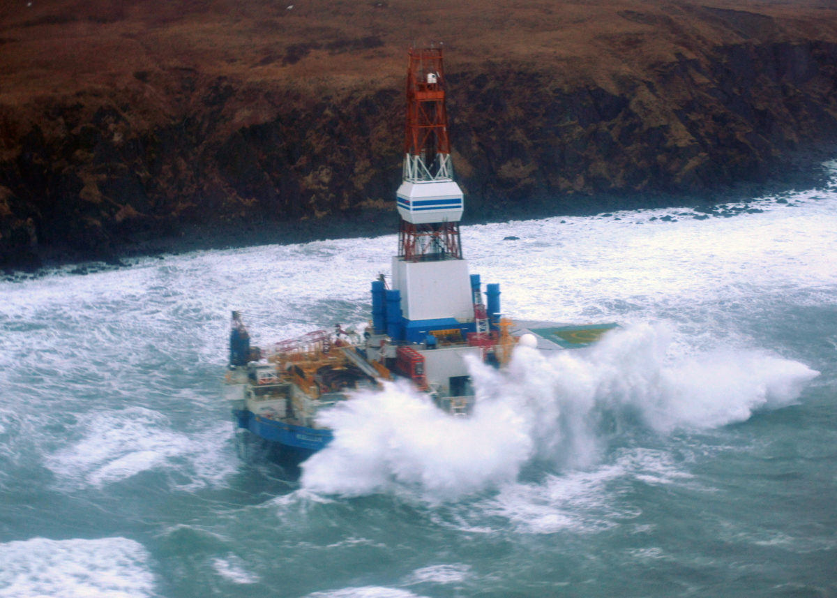 An oil rig in the Artic amongst harsh waves