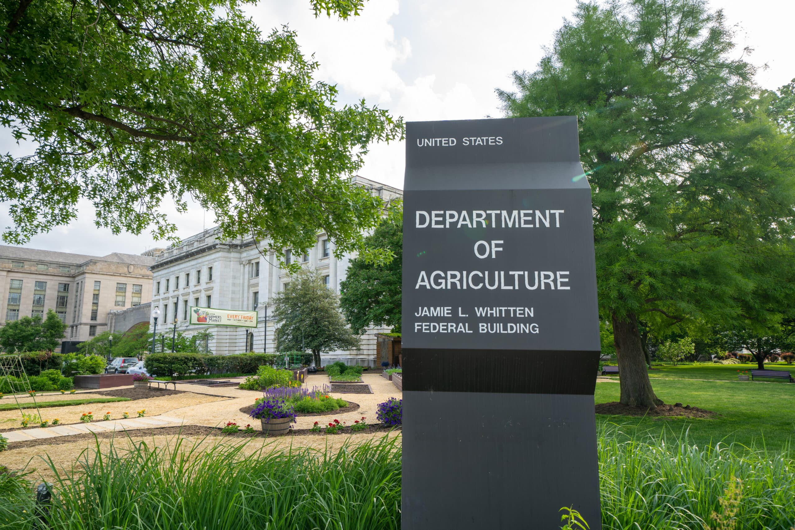 May contain a sign for the Department of Agriculture, Jamie L. Whitten Federal Building.