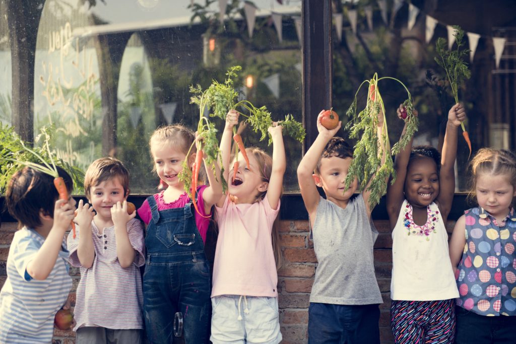 Children Celebrating Carrots and other Vegetables