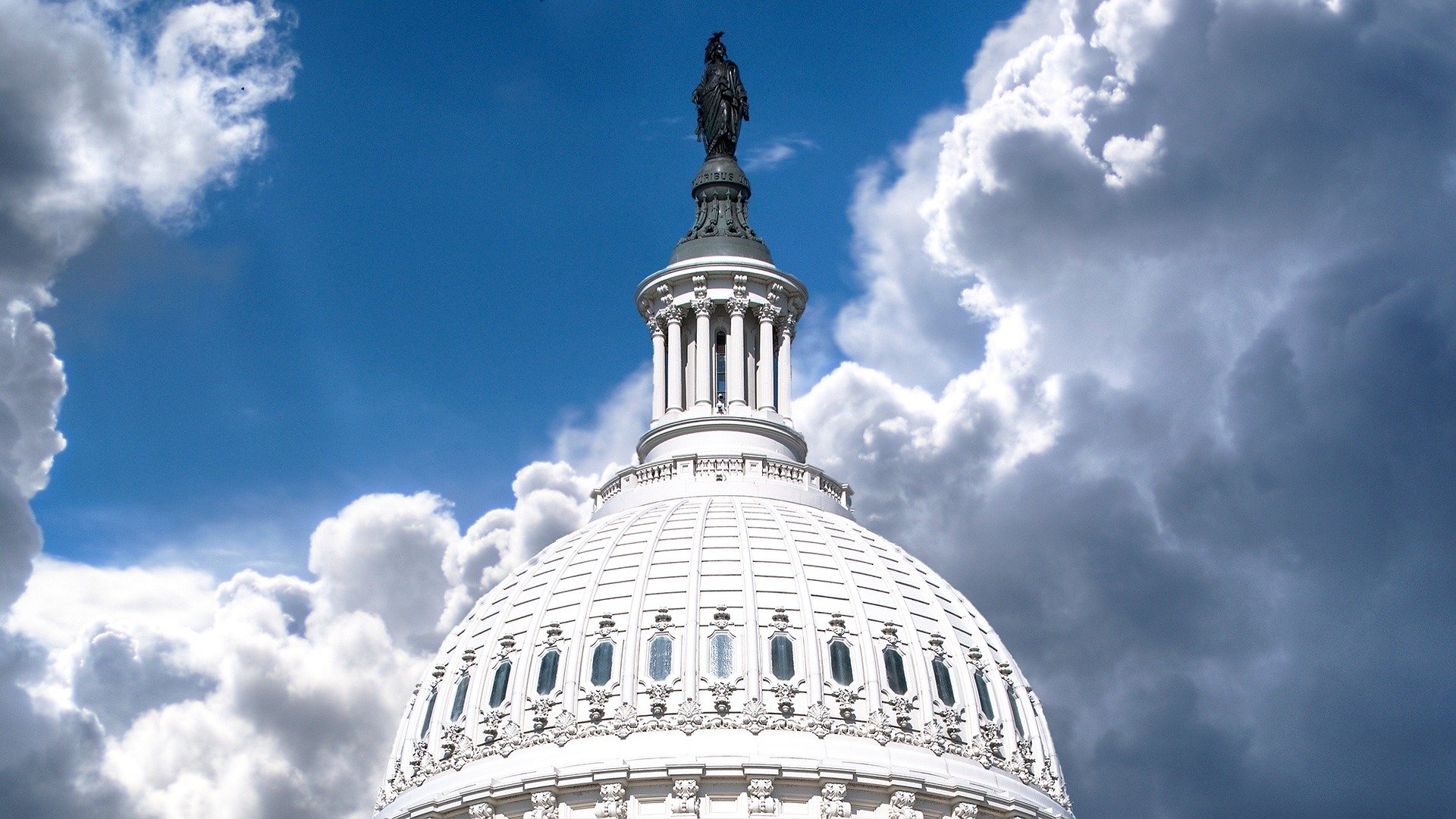 Capitol Building Dome Against a Sunny, Cloudy Sky