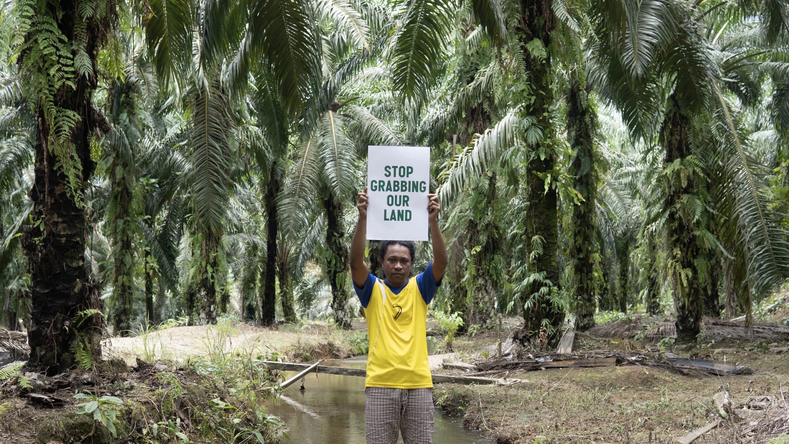 Man holding sign