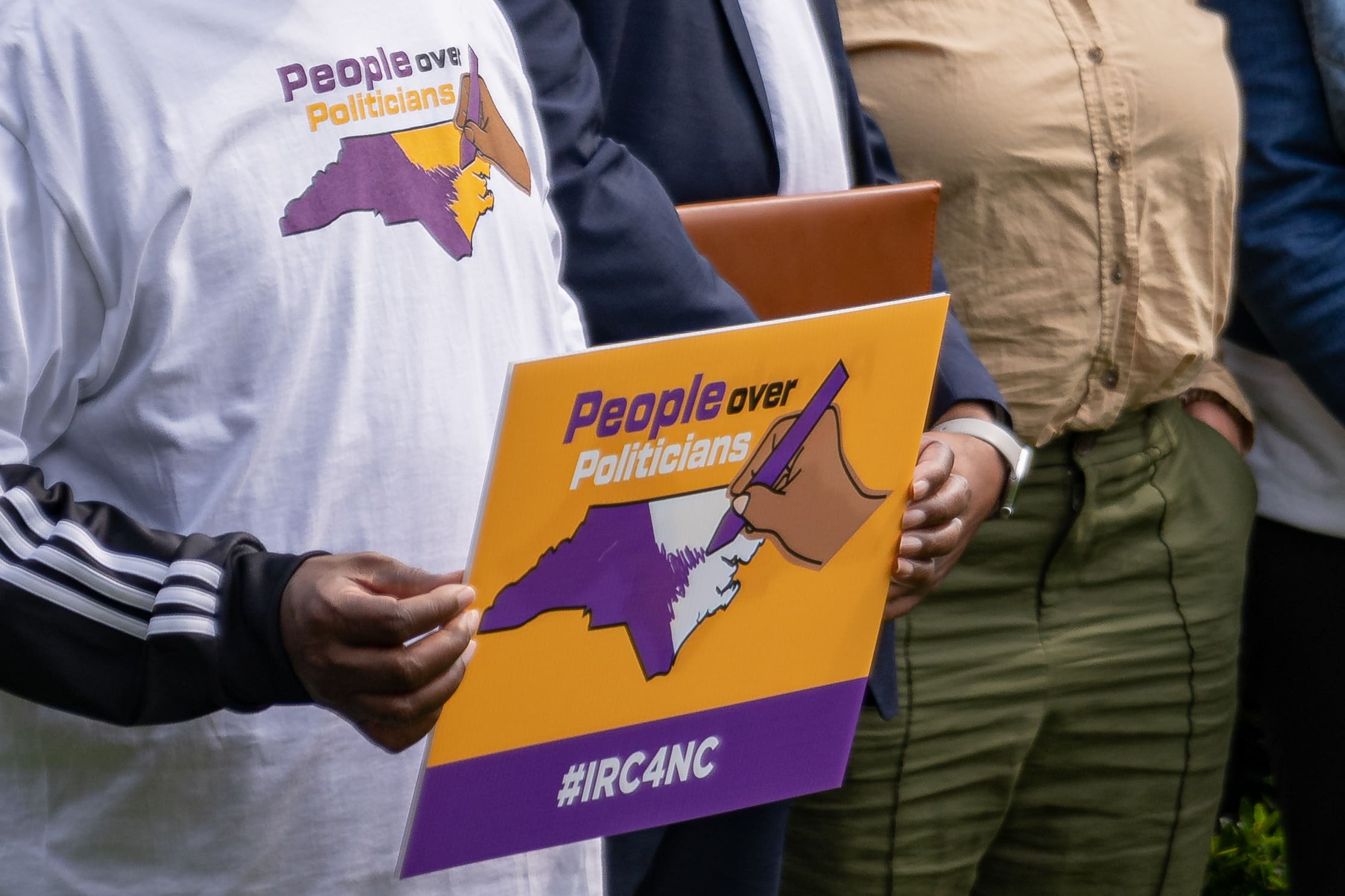 people over politicians sign