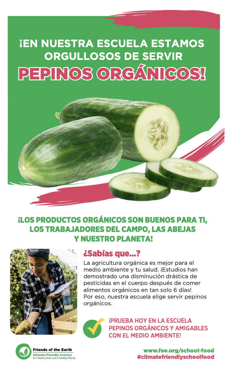 May contain two people, one in foreground with a clipboard, and organic cucumbers.