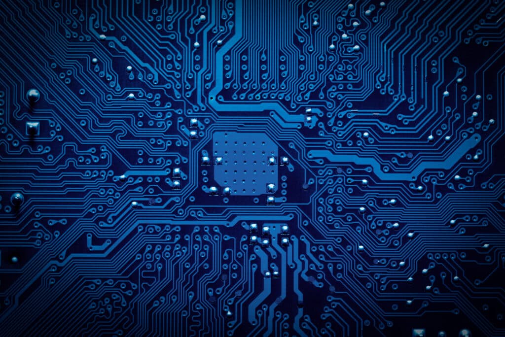 May contain a close-up of a blue computer circuit board.