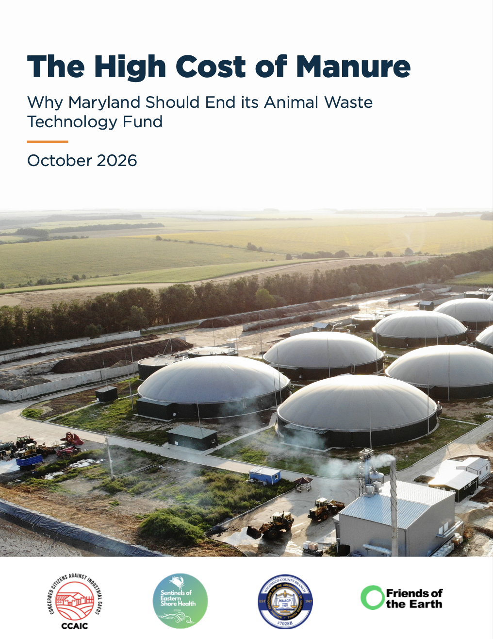 May contain a biogas digester facility with large dome structures and agricultural fields.
